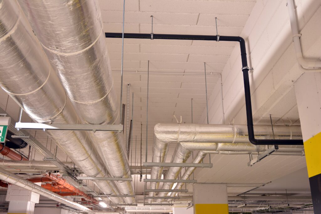 vecteezy sanitary system pipes and electrical cables installed under 33830444